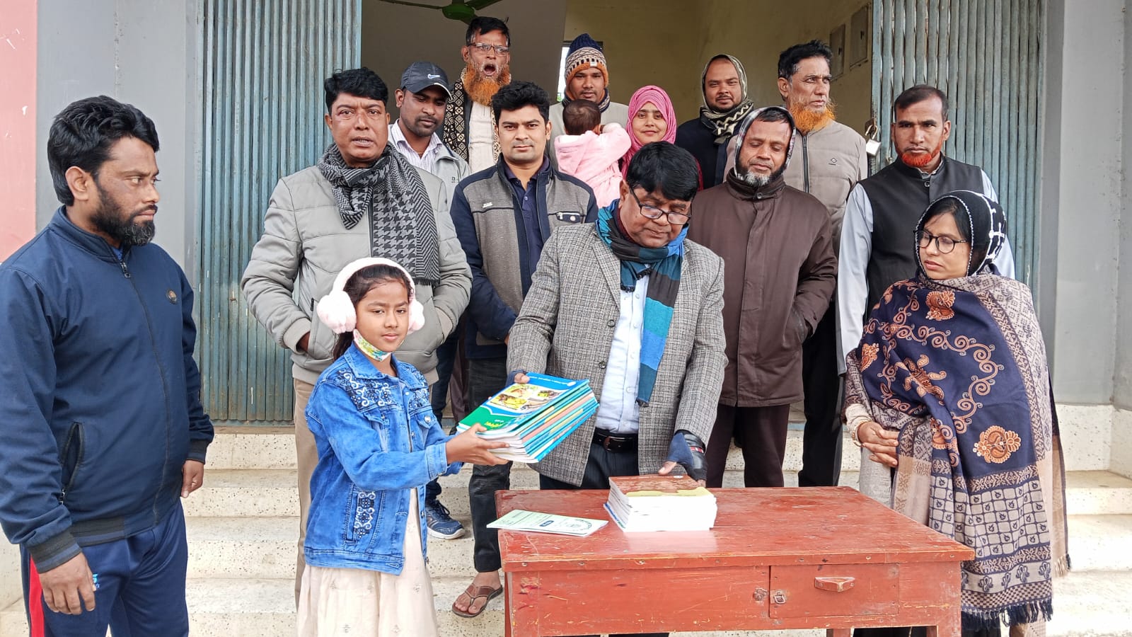 ১লা জানুয়ারি ২০২৬। শিক্ষার্থীদের মাঝে বই বিতরণ।